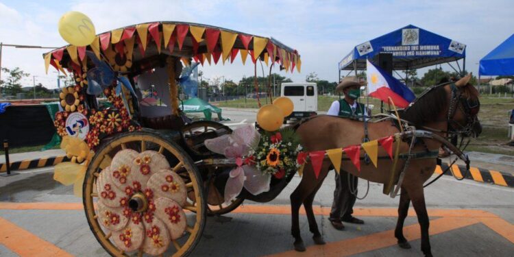 Kalesas tours folks around downtown San Fernando